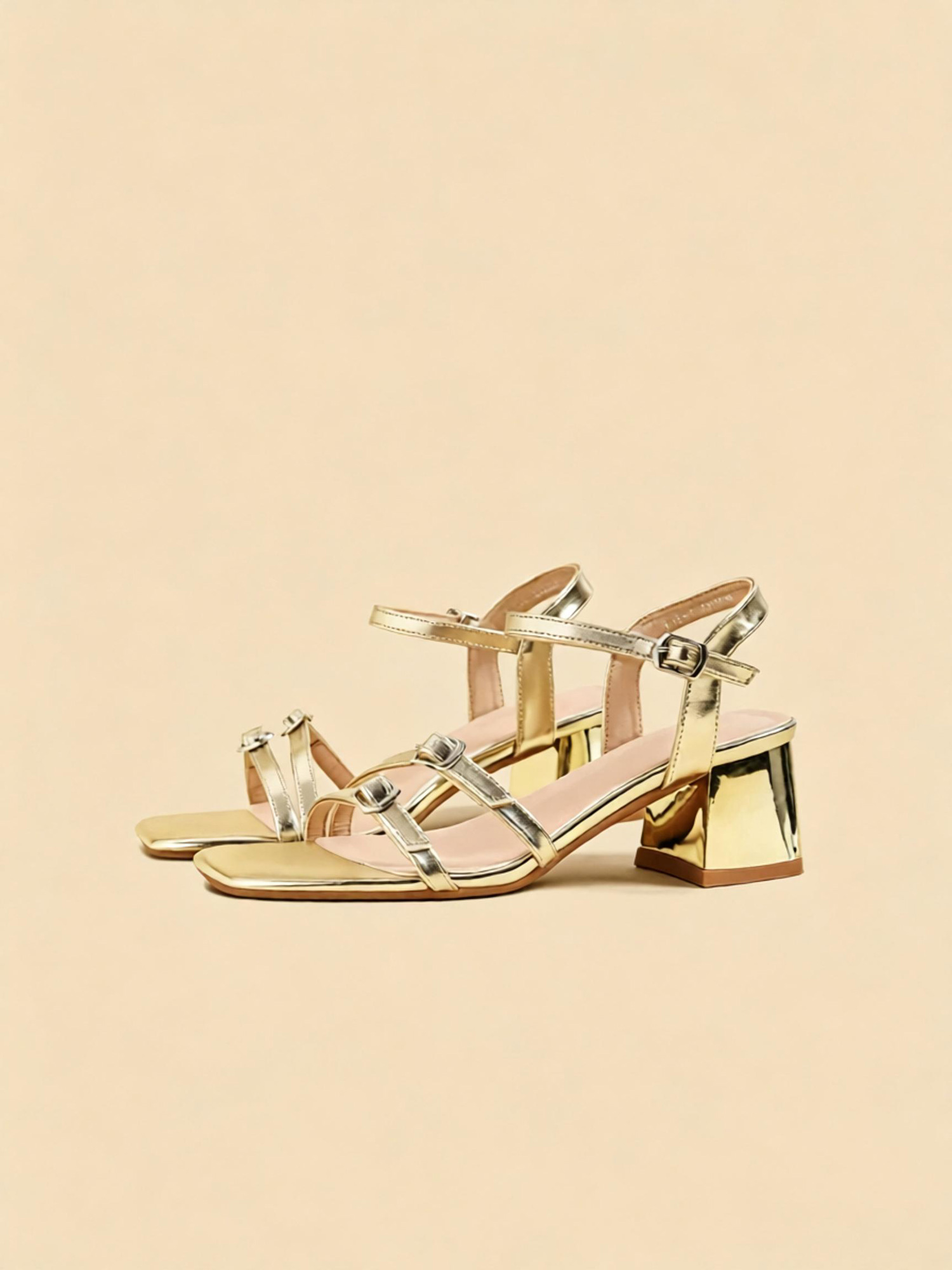 Aurora gleam sandals front view, gold open-toe sandals with buckle straps