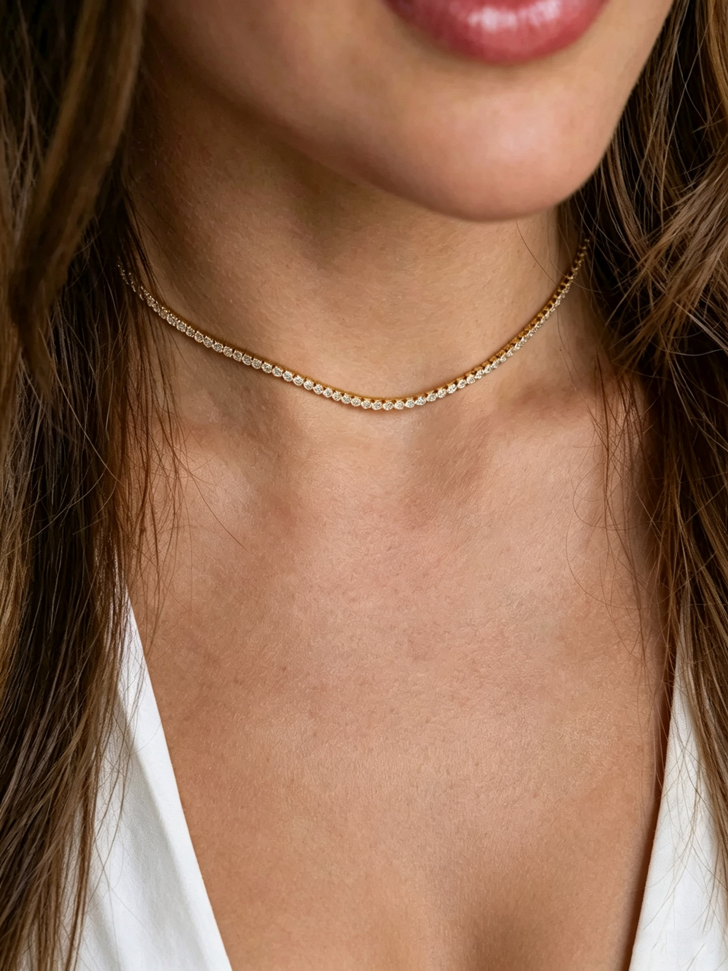 Lumina Tennis Necklace worn on model neck, thin close fit tennis necklace for daily styling