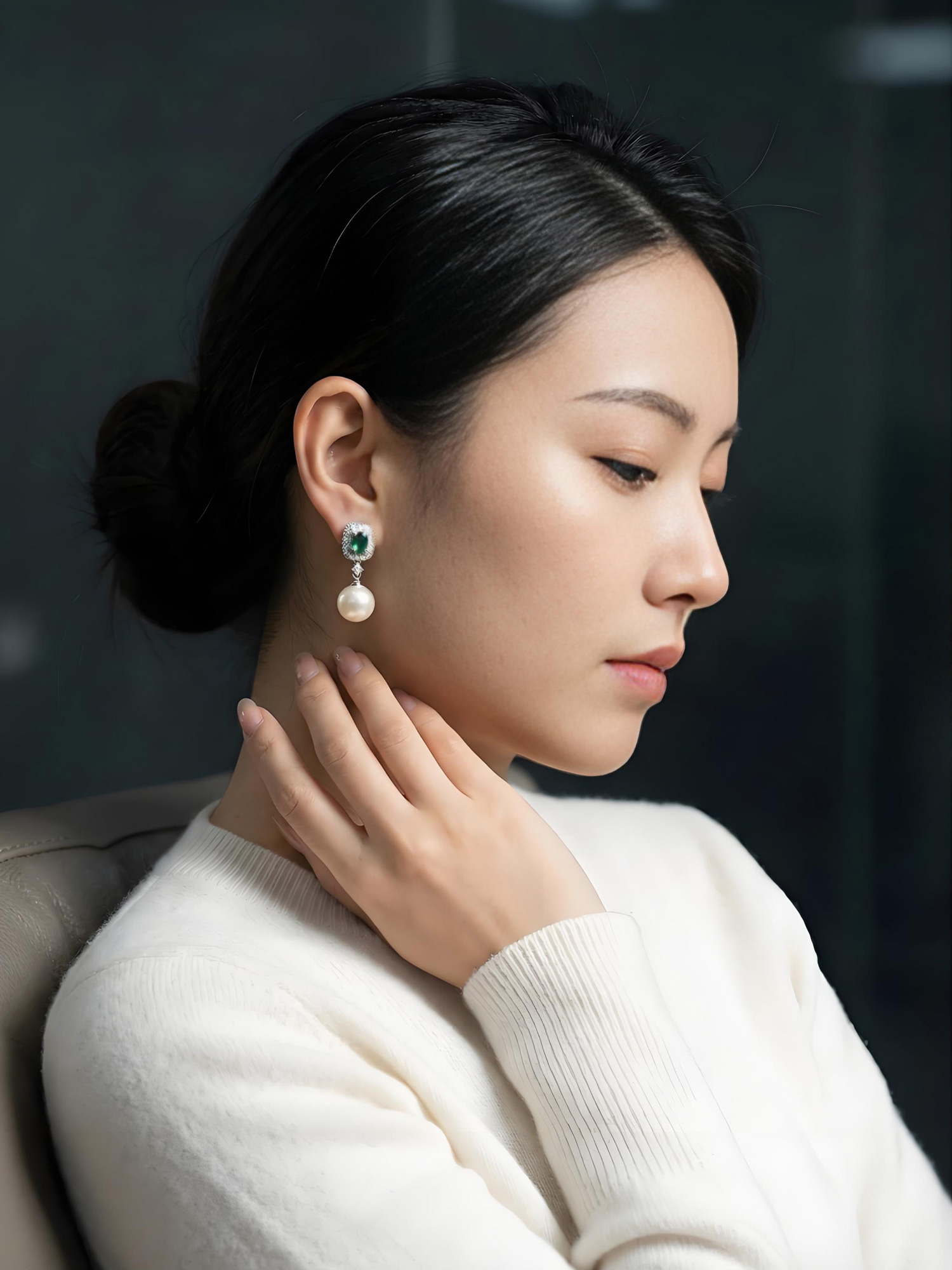 Macro detail of double pave zircon halo on green dream pearl drop earring