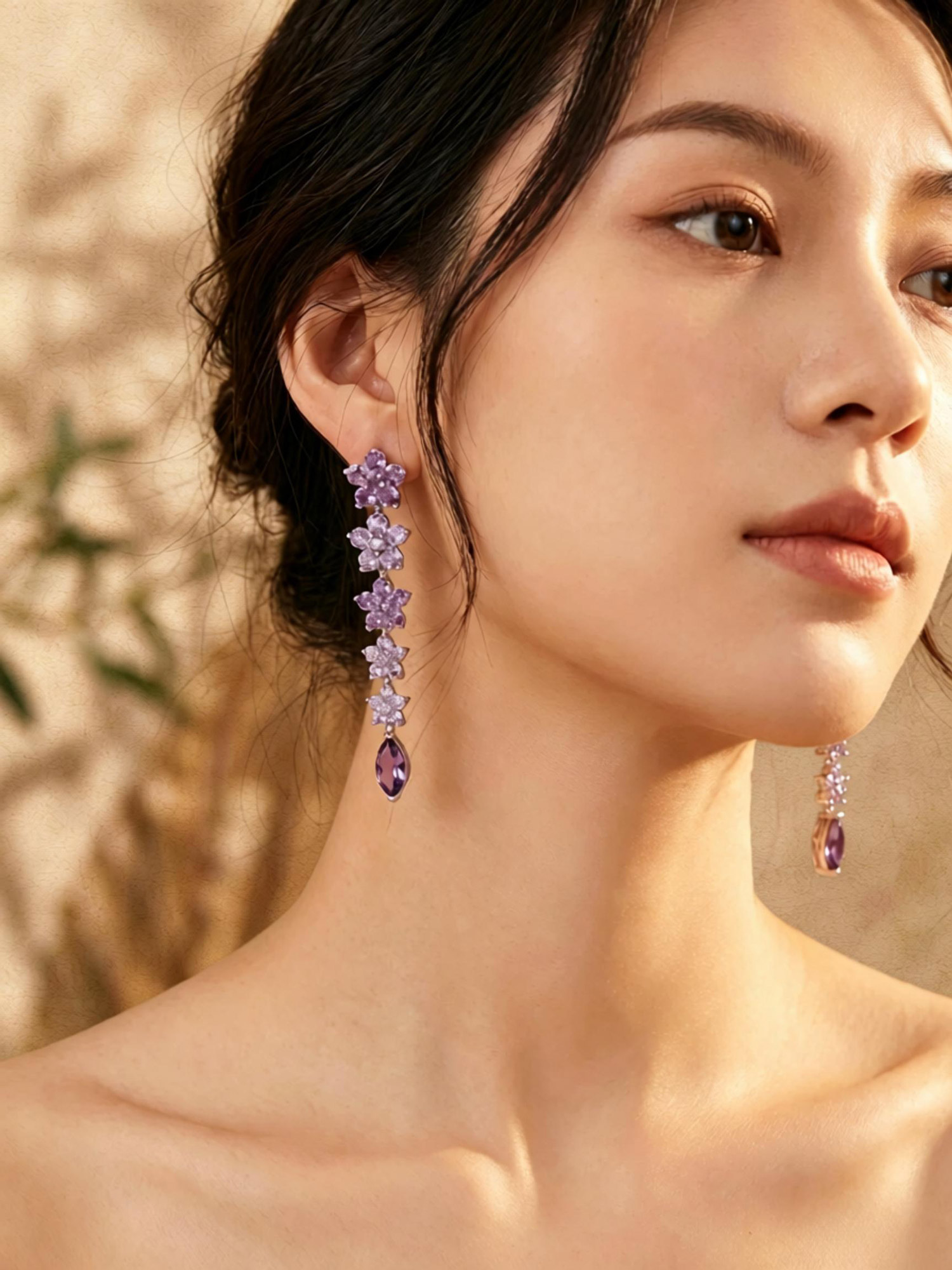 Macro detail of marquise purple zircon drop on wisteria glimmer earring