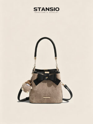STANSIO vintage bow bucket bag with braided handle and fluffy plush charm on beige background