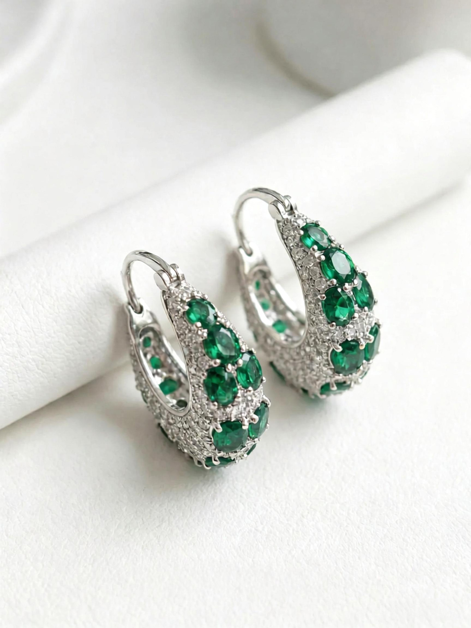 Side profile view handcrafted green galaxy hoop statement earrings