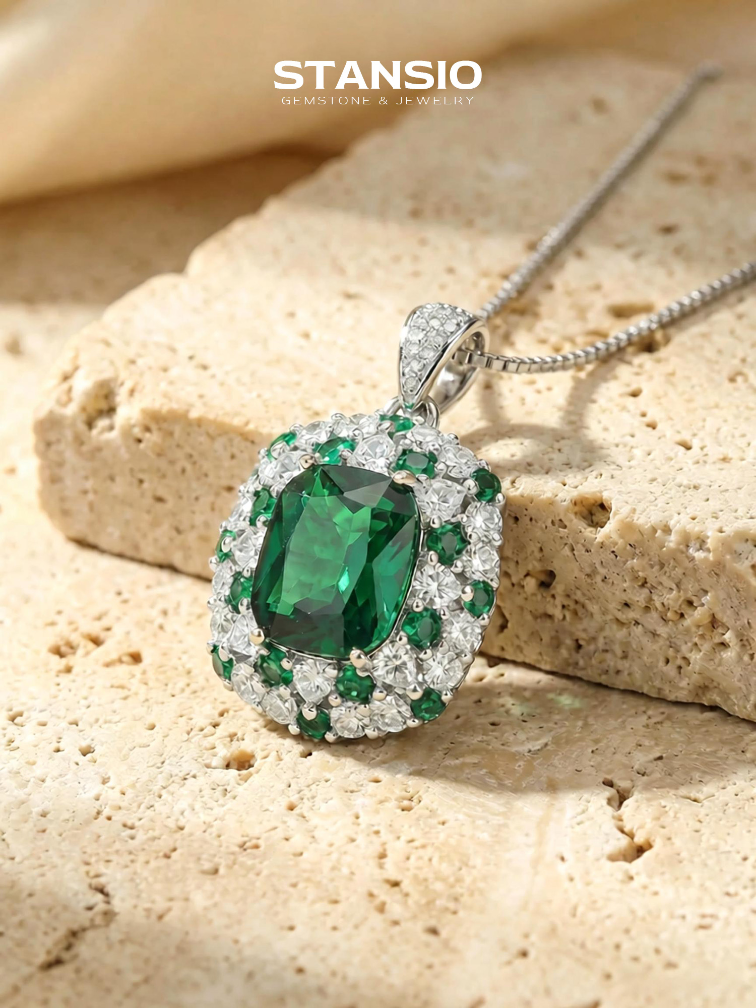 Stansio emerald journey pendant necklace, vivid emerald centre stone with clear zircon halo