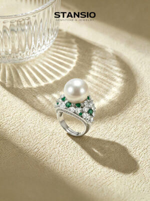 Stansio floating pearl ring, luminous freshwater pearl centre stone with emerald green zircon halo
