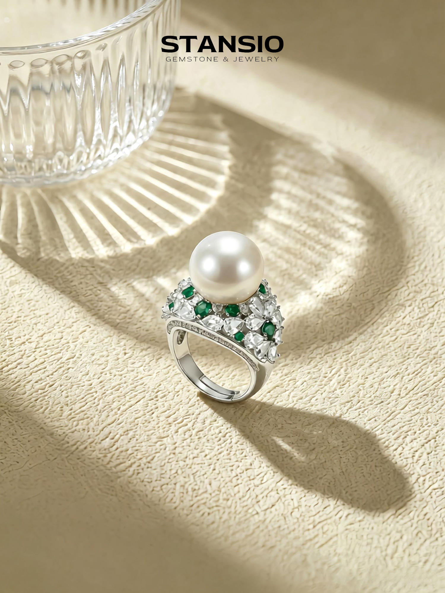 Stansio floating pearl ring, luminous freshwater pearl centre stone with emerald green zircon halo