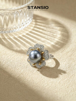 Stansio midnight flower pearl ring, dark iridescent pearl centre with zircon flower petals