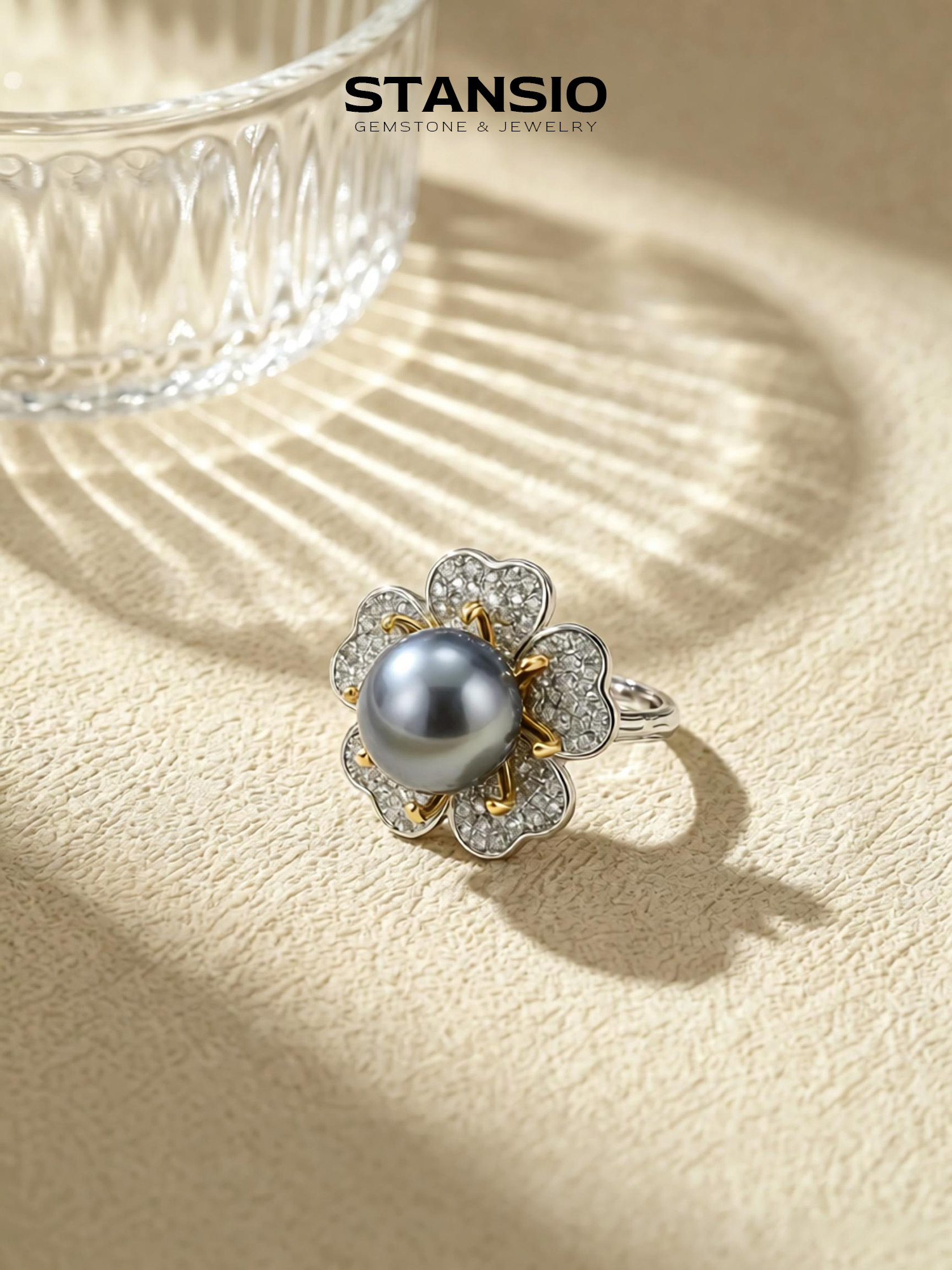 Stansio midnight flower pearl ring, dark iridescent pearl centre with zircon flower petals