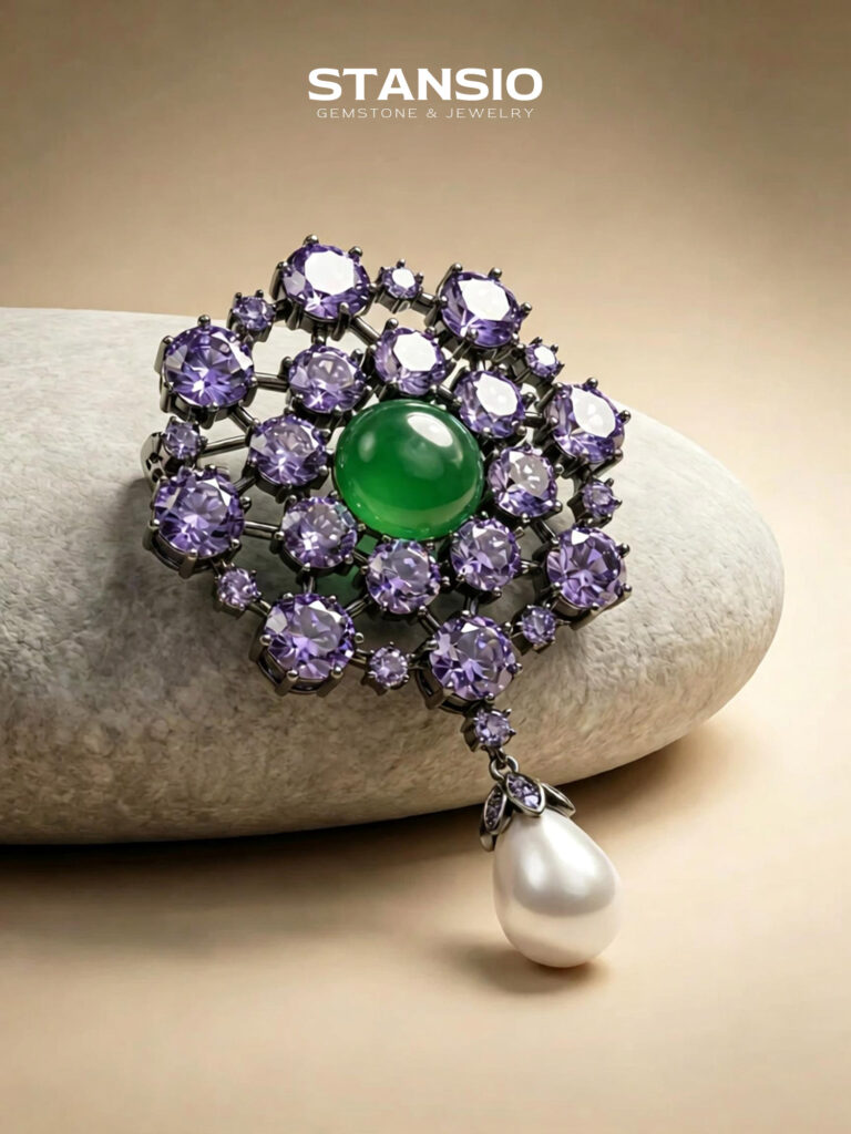 Stansio violet pearl brooch paired with vintage formal outfit, ornate two‑tone gem brooch on neutral fabric