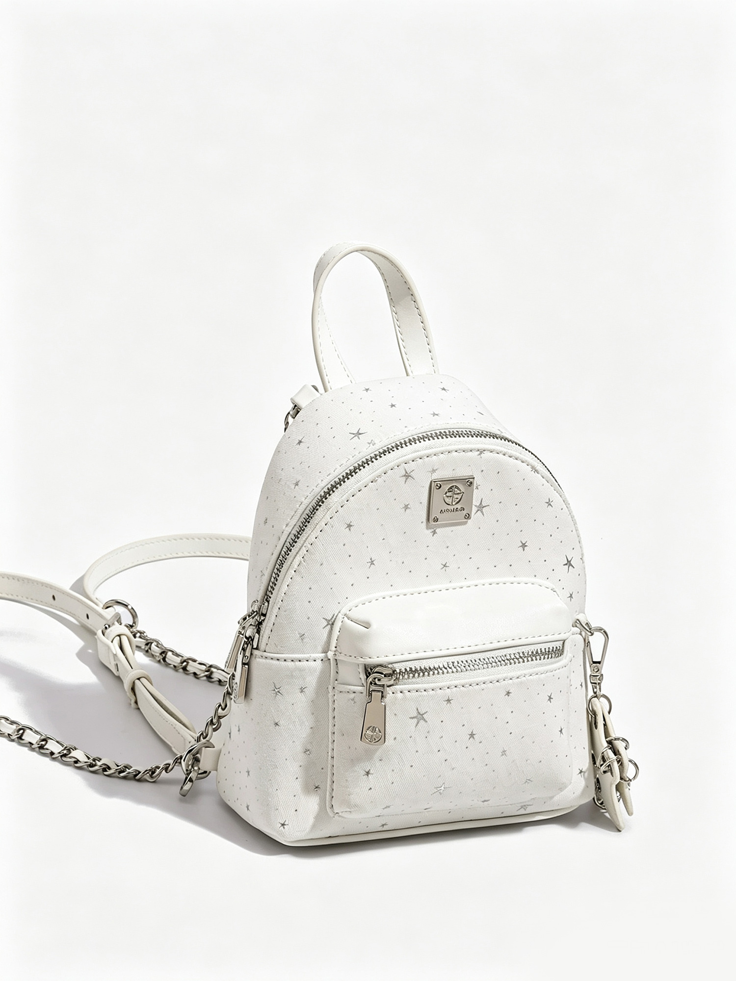 Starry white mini backpack angled view, mixed chain strap mini backpack for women